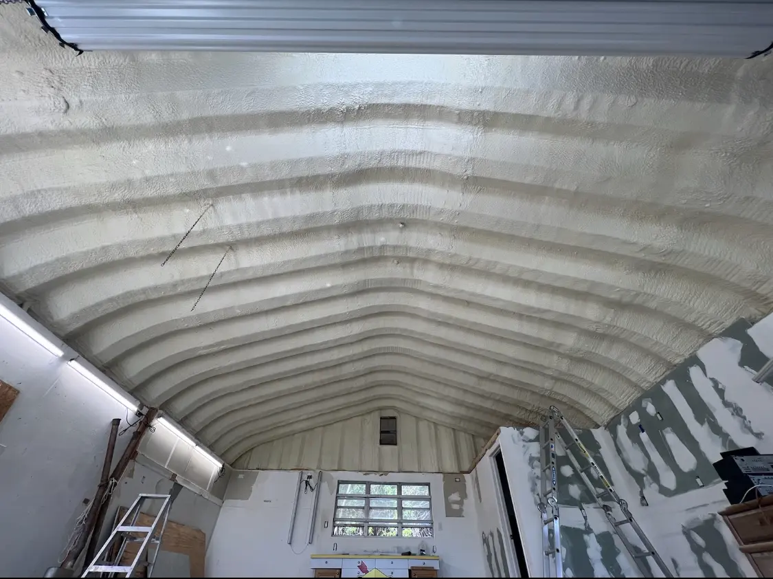 Spray polyurethane foam applied to the underside of a metal roof deck in McCandless